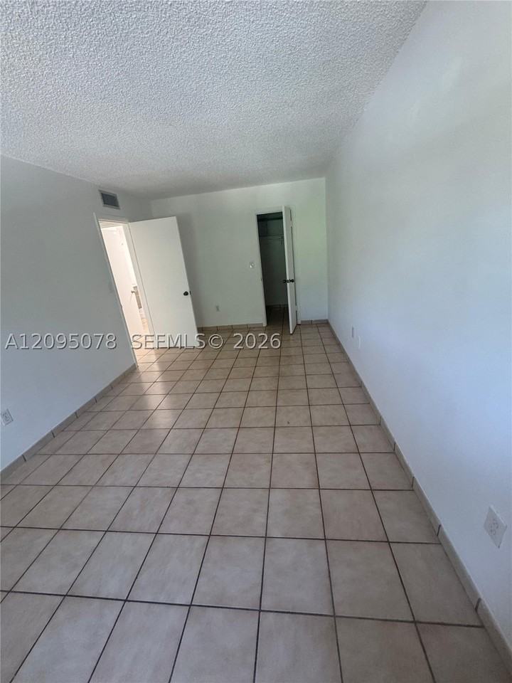 4265 Nw South Tamiami Canal Dr #1-214 - Photo 5 of 11