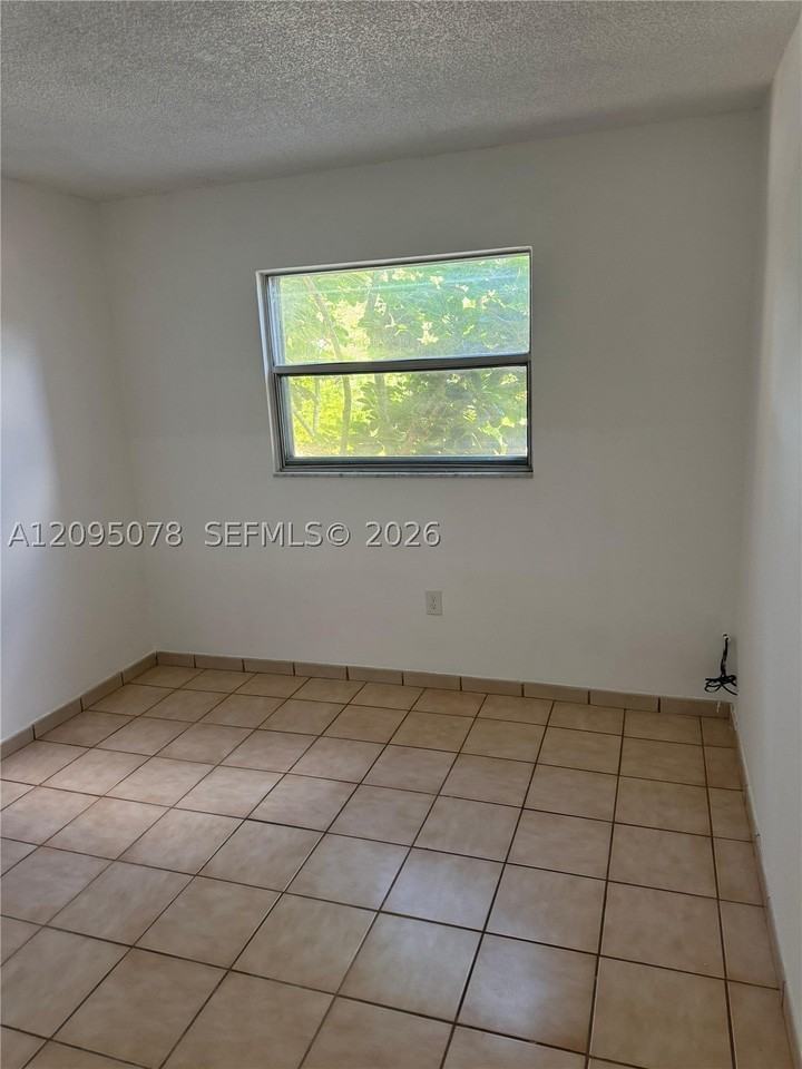 4265 Nw South Tamiami Canal Dr #1-214 - Photo 6 of 11