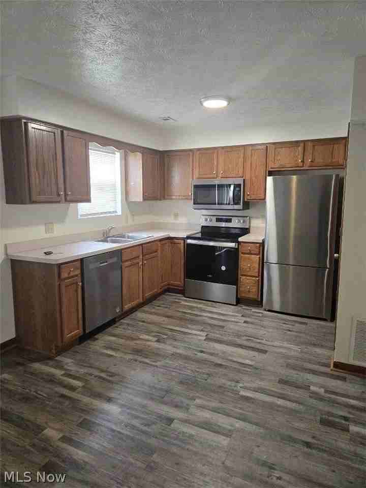 235 Pleasant St - Photo 4 of 13