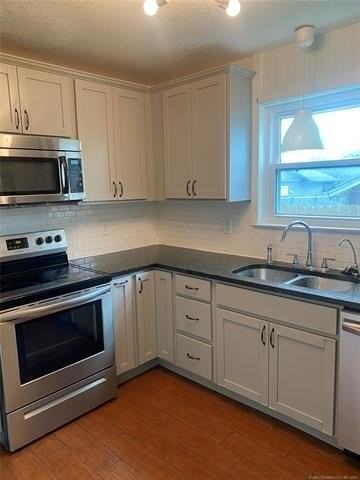 15010 E 35th Pl - Photo 2 of 14
