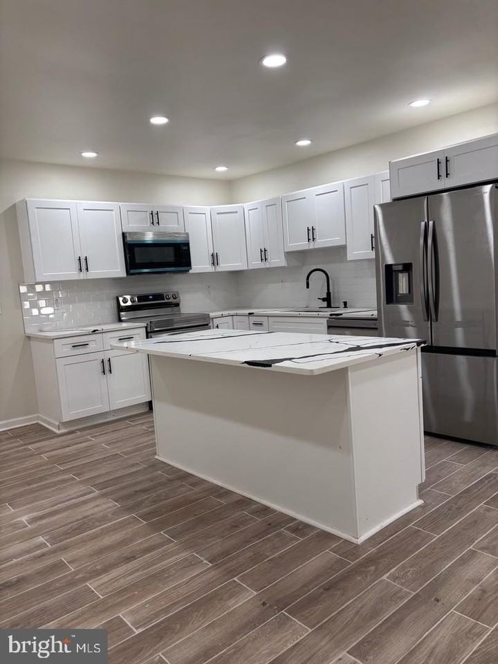 402 Colwyn Ave - Photo 5 of 31