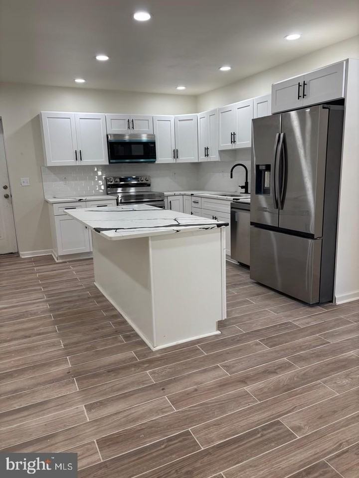 402 Colwyn Ave - Photo 6 of 31