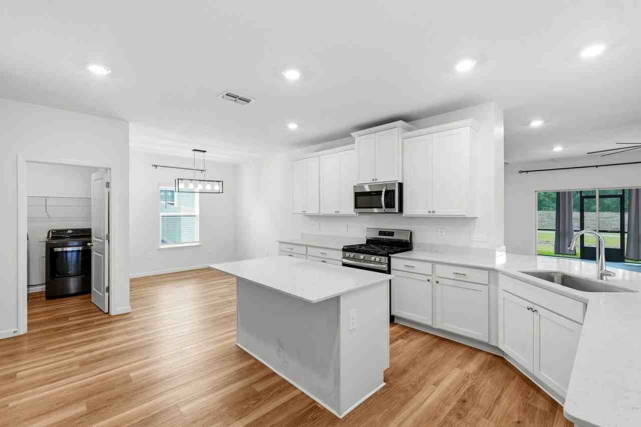 13697 Nw Convergence Blvd - Photo 3 of 34
