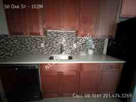 featured image of 50 Oak St #102M