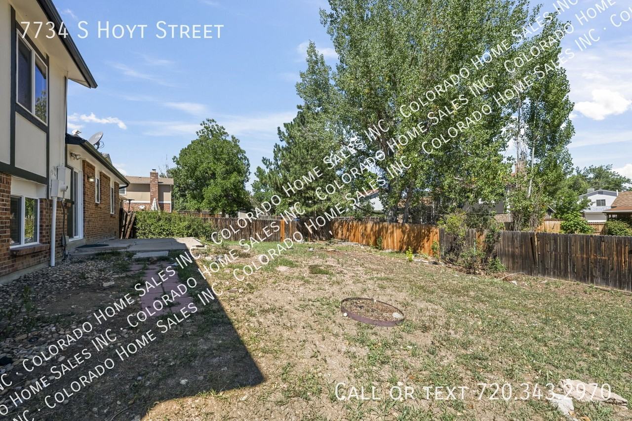 7734 S Hoyt St - Photo 2 of 23