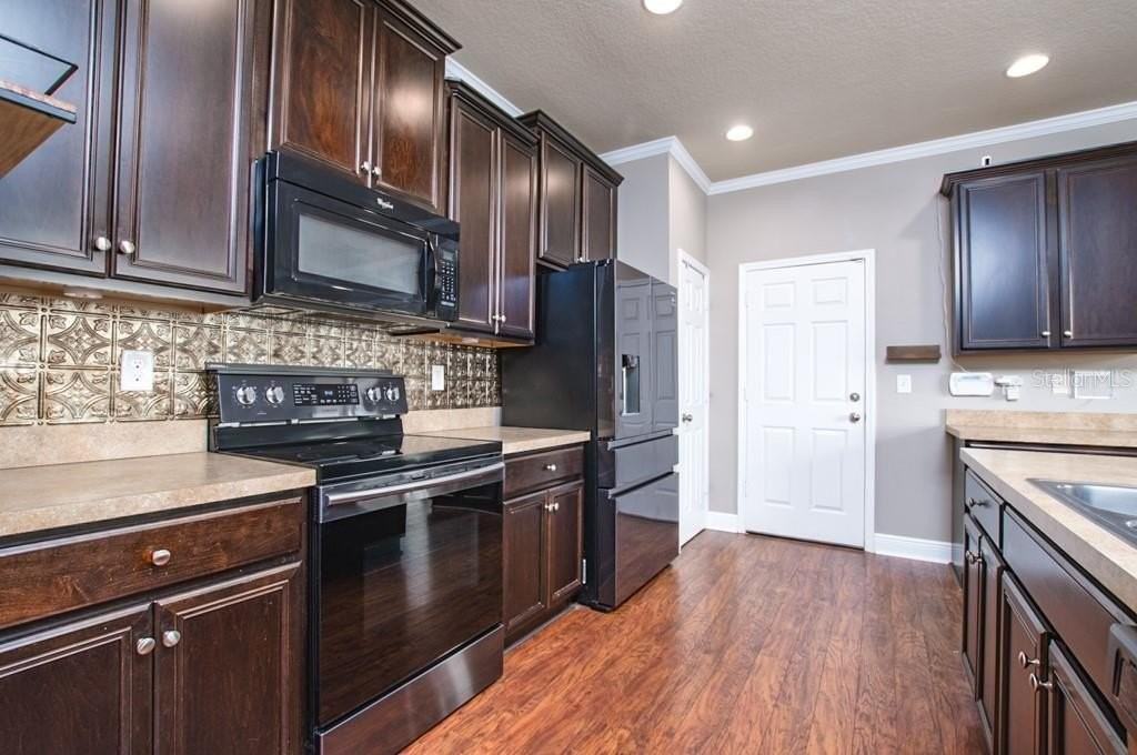 8639 Turnstone Shore Ln - Photo 3 of 49