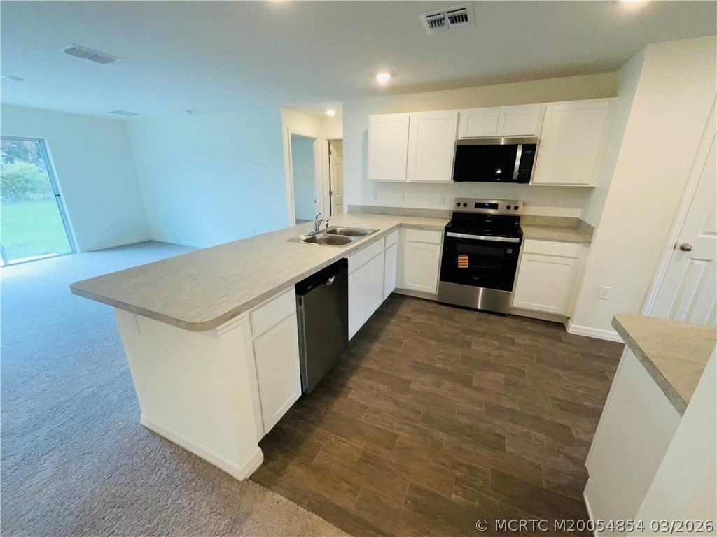 1701 Se Manth Ln - Photo 5 of 17