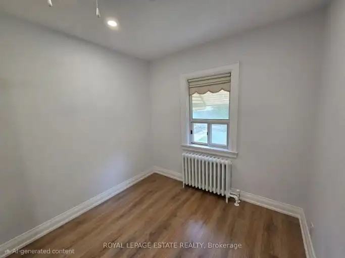 839 Coxwell Ave - Photo 5 of 14