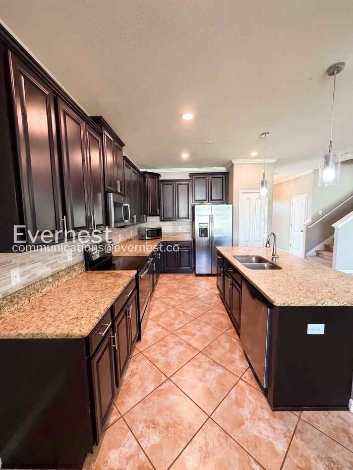 13247 Wellington Hills Dr - Photo 4 of 32