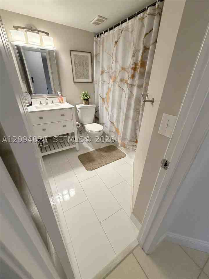 8741 Wiles Rd #204 - Photo 5 of 11