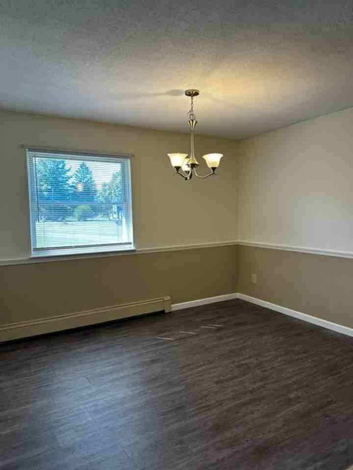 New Carriage House Apartments - Photo 3 of 19