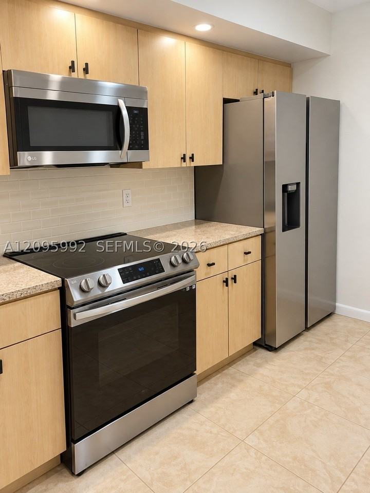 18870 Nw 57th Ave #202 - Photo 3 of 22