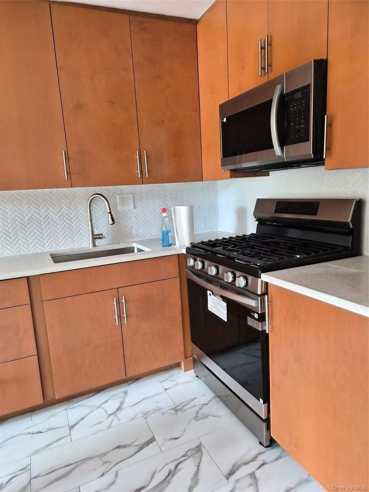 1828 Bell Blvd #1FL - Photo 3 of 8