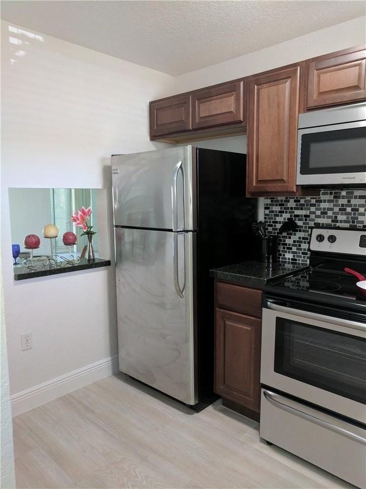 8465 Sunrise Lakes Blvd #101 - Photo 2 of 3