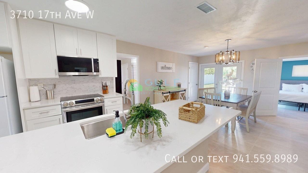 3710 17th Ave W - Photo 2 of 14