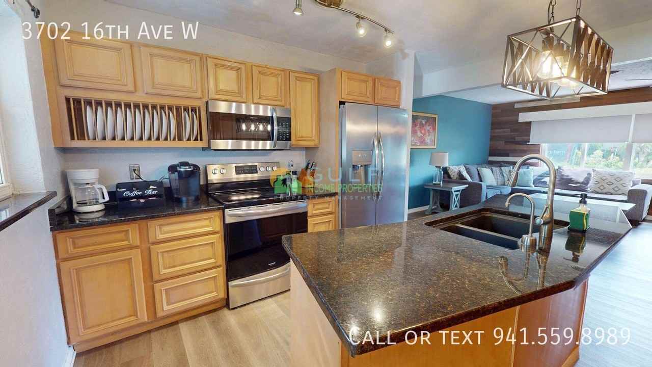3702 16th Ave W - Photo 5 of 19
