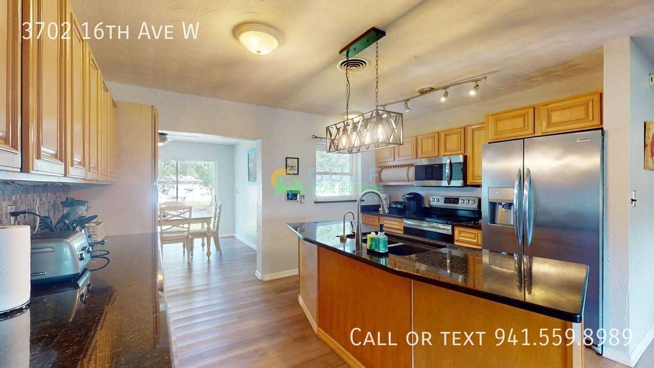 3702 16th Ave W - Photo 6 of 19