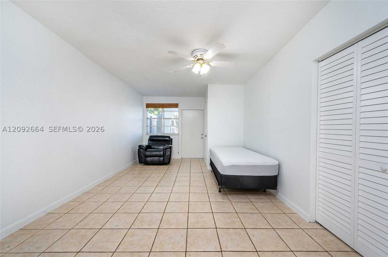 1345 W 71st St - Photo 5 of 23