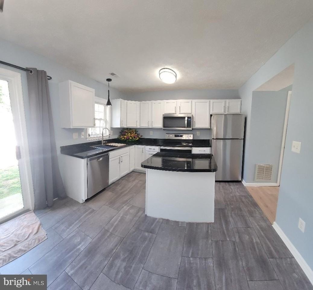 10612 Guilderland Ct - Photo 2 of 14