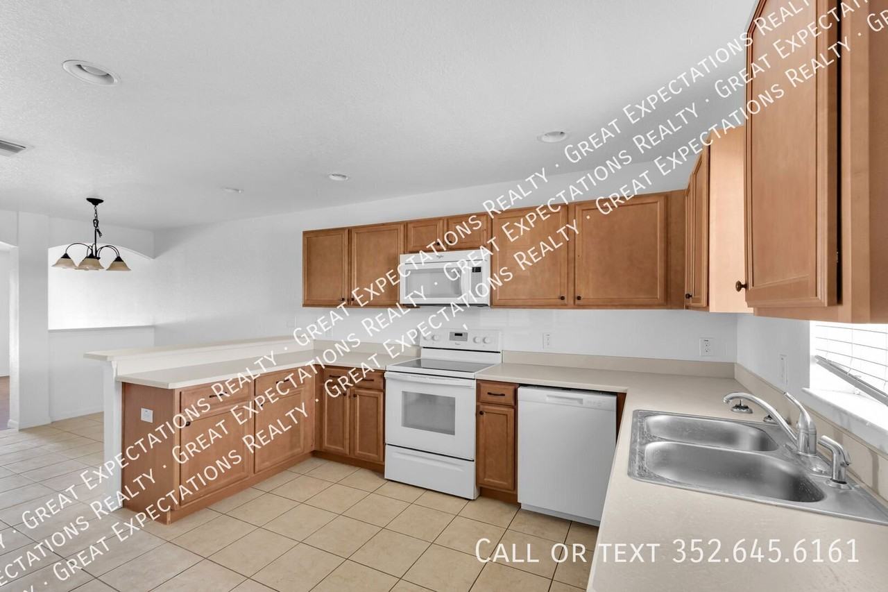 10542 Se 67th Ct - Photo 3 of 21
