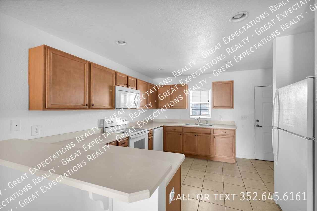 10542 Se 67th Ct - Photo 4 of 21