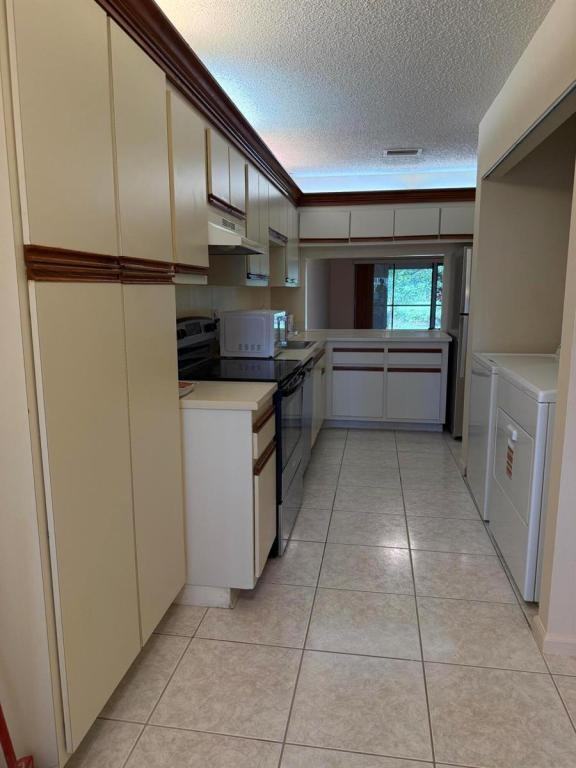 12028 Royal Palm Blvd - Photo 2 of 9