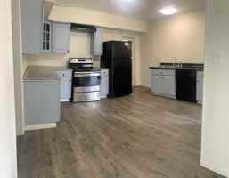 featured image of 203 W 6th St