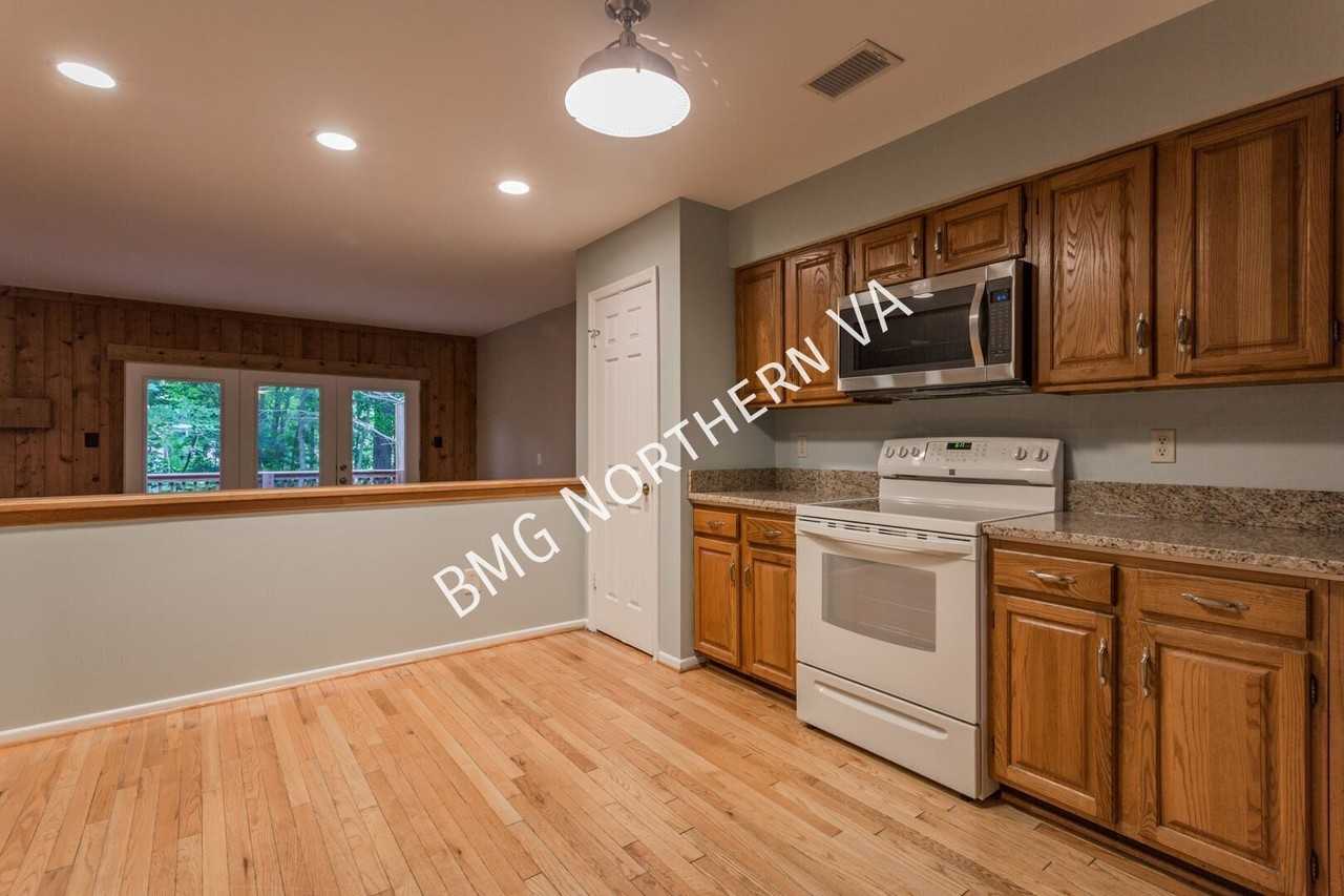 12518 Flatwood Cir - Photo 7 of 29