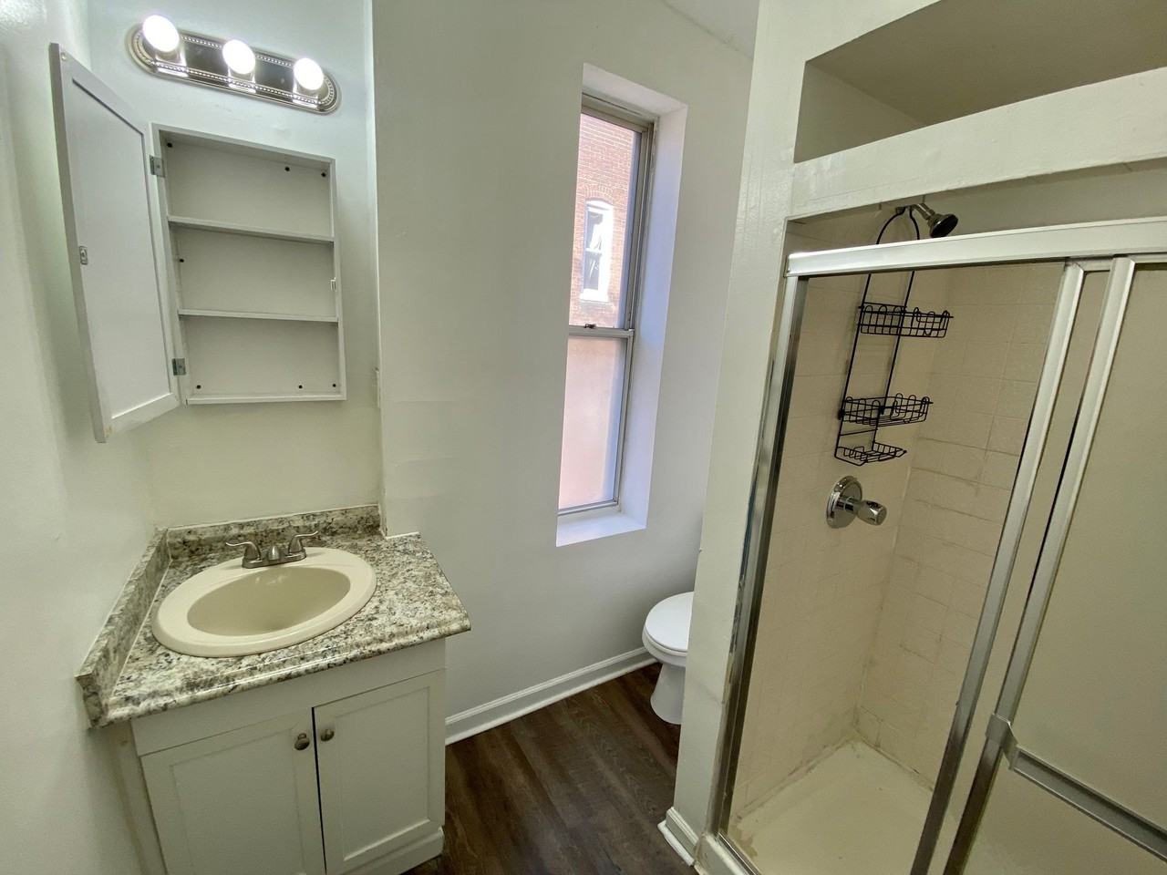 2504 N Calvert St – Your Timeless Urban Retreat! - Photo 5 of 14