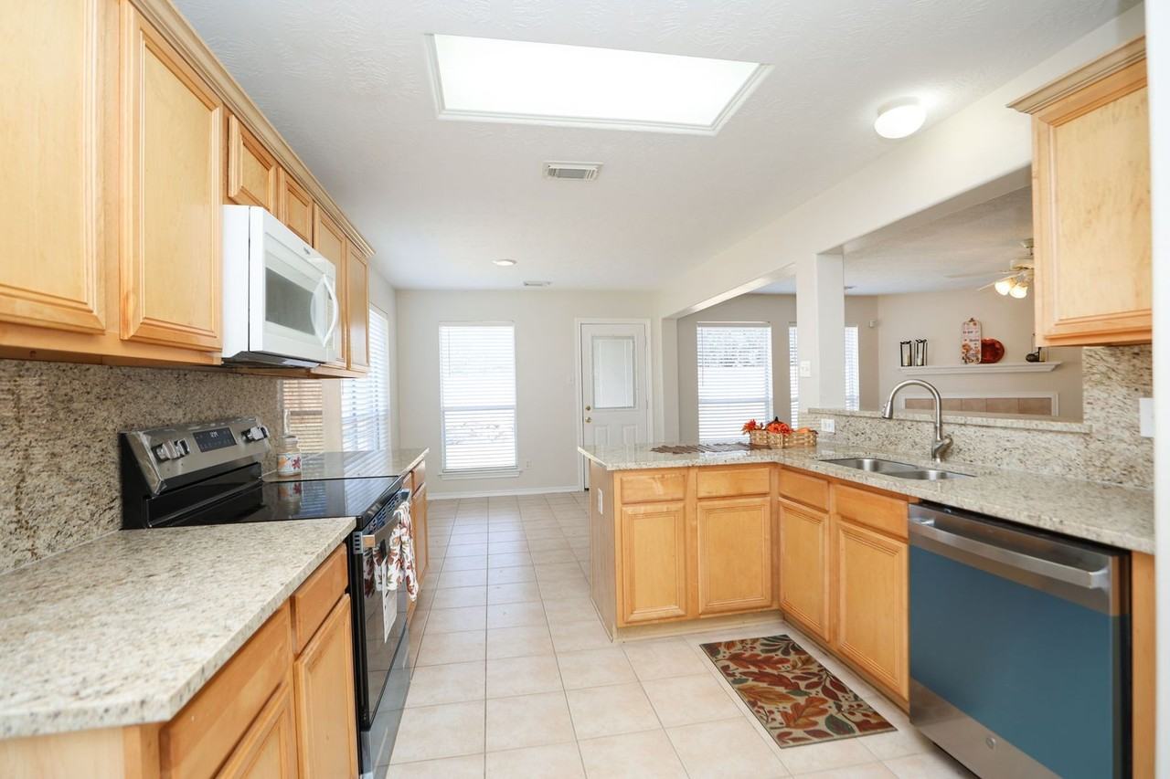 18910 Piney Bend Ct - Photo 7 of 24