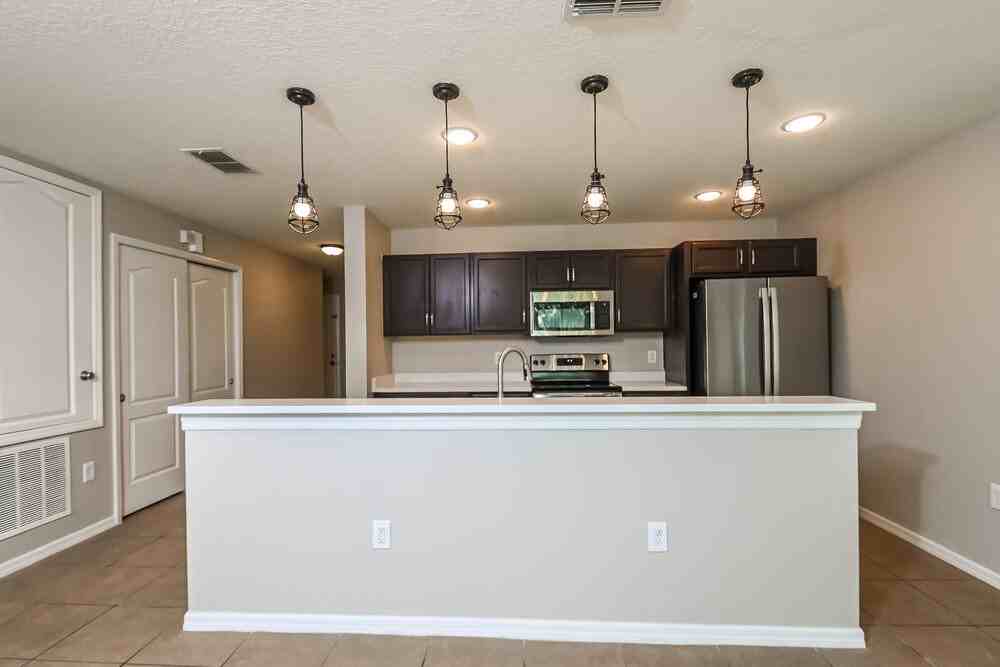 7605 Tangle Rush Dr - Photo 6 of 16