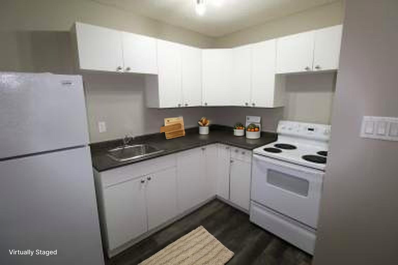 Gemini Apartments - Photo 2 of 21