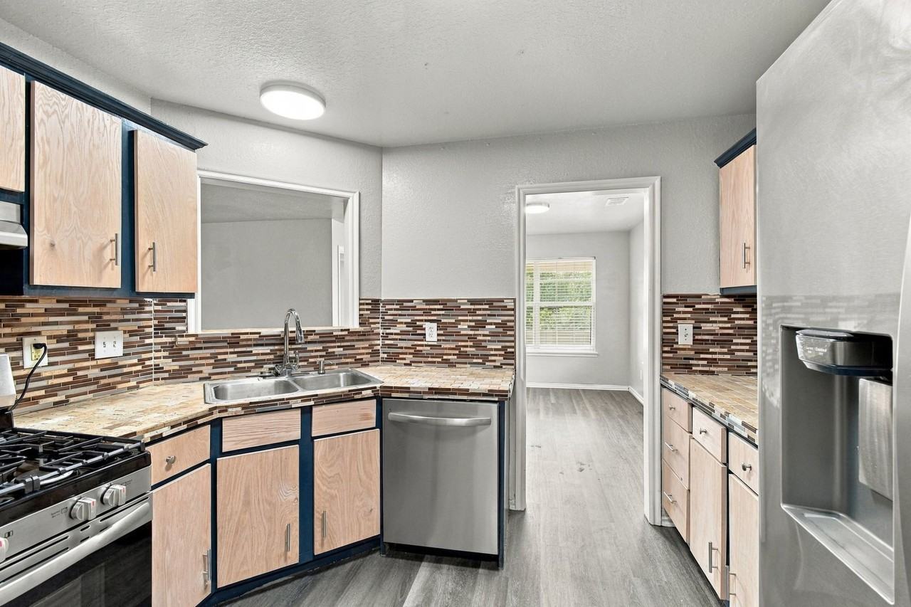 5920 S 32nd West Ave - Photo 3 of 22