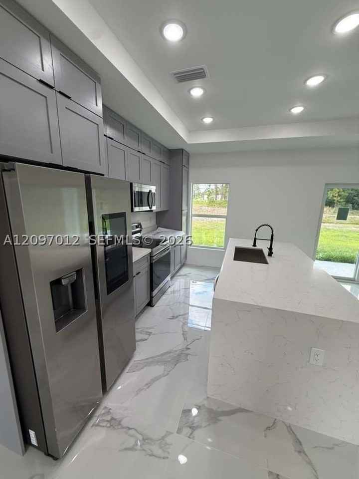 765 PUCCINI AVE S #765 - Photo 5 of 21