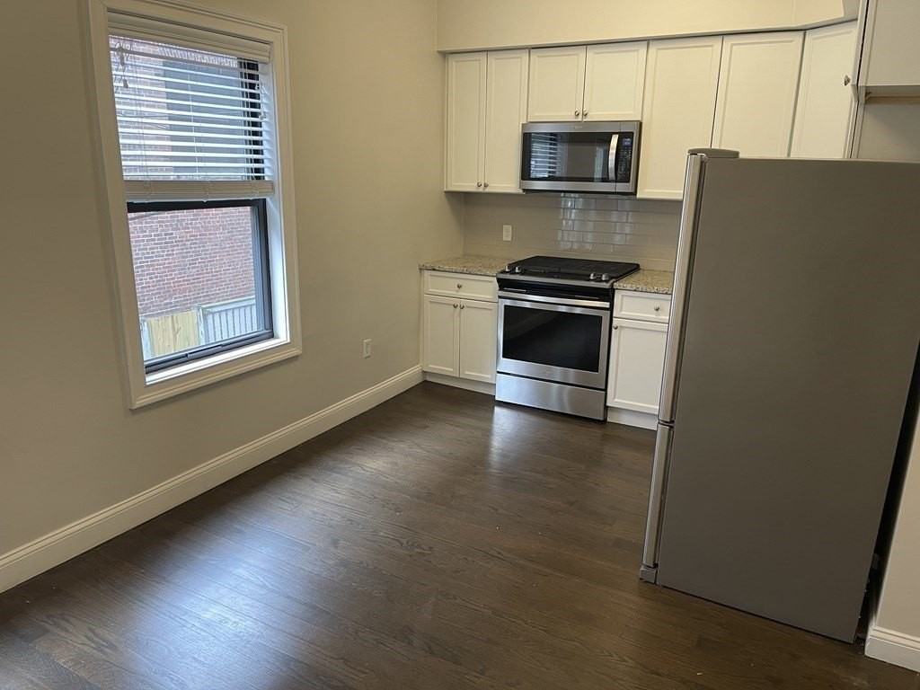 135 Havre St #1 - Photo 2 of 10