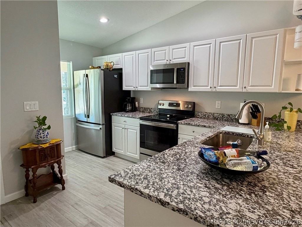 5860 Se Normandy Ave - Photo 4 of 29