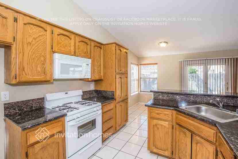 8767 Hollowstone Way - Photo 7 of 17