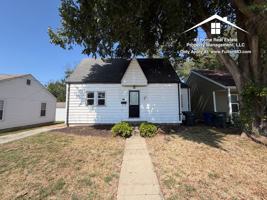featured image of 213 E 6th St