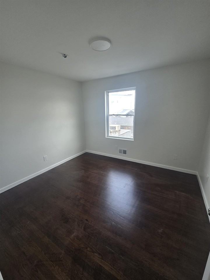 596 70th St #1 - Photo 5 of 12