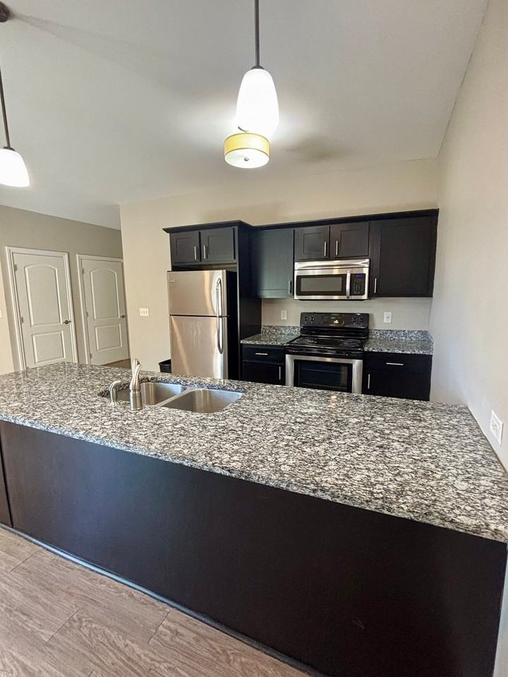 2493 Sweet Home Rd #2-203 - Photo 2 of 15