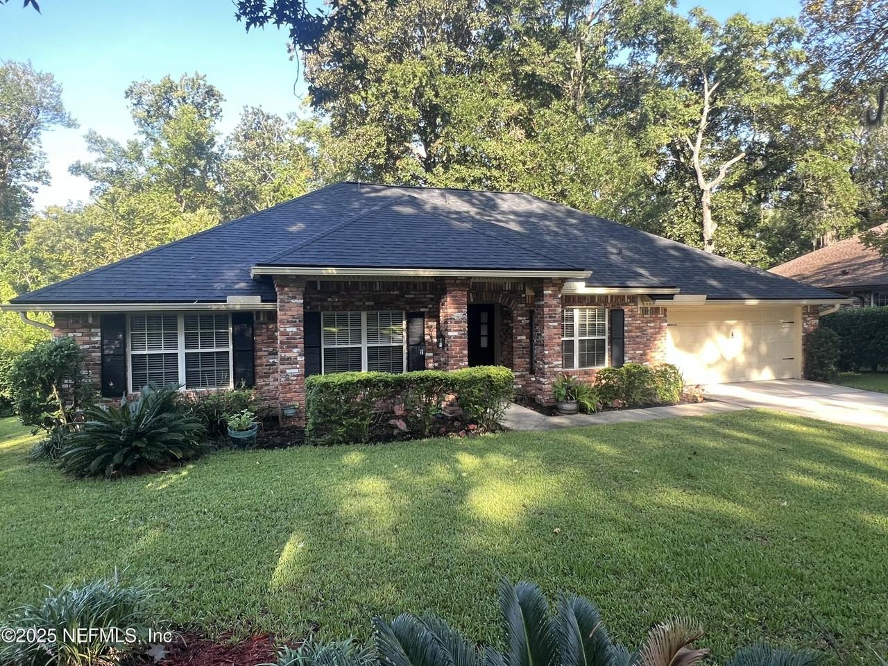 12152 Dividing Oaks Trl W - Photo 2 of 50