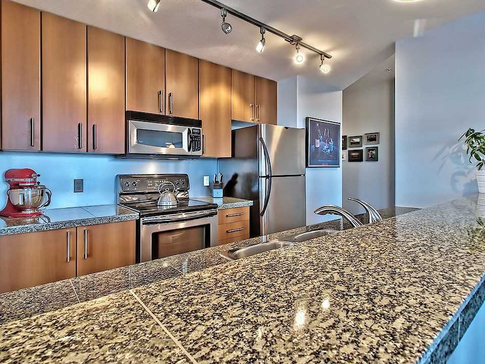 1010 - 1010 Centre Avenue Northeast - Photo 3 of 21