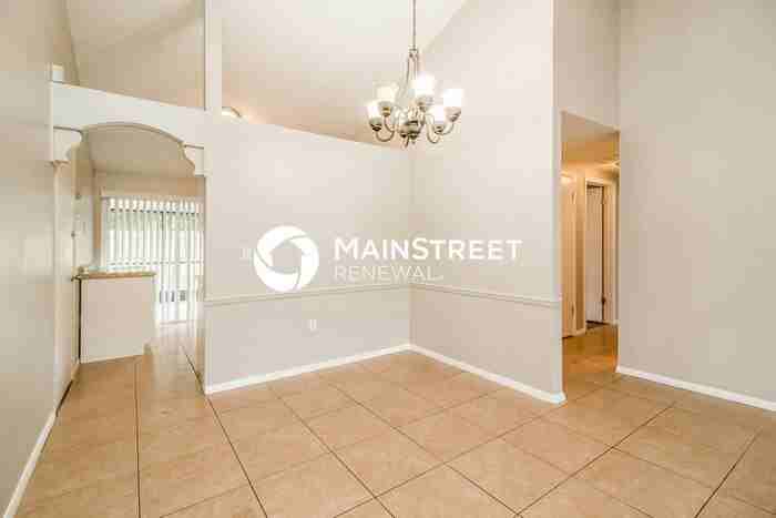 10114 Enchanted Oaks Ct - Photo 5 of 16