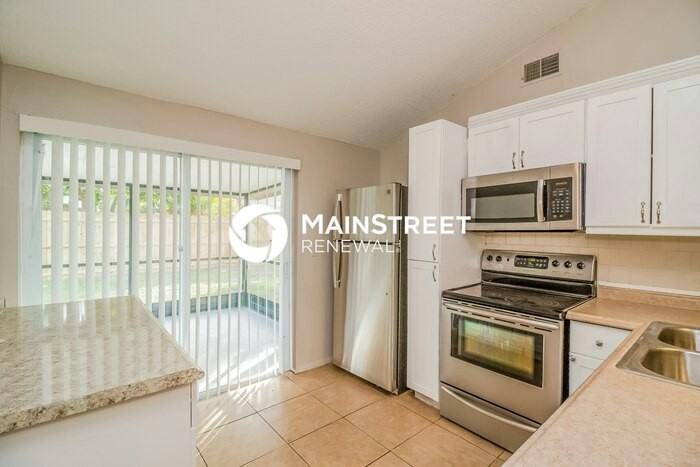 10114 Enchanted Oaks Ct - Photo 6 of 16