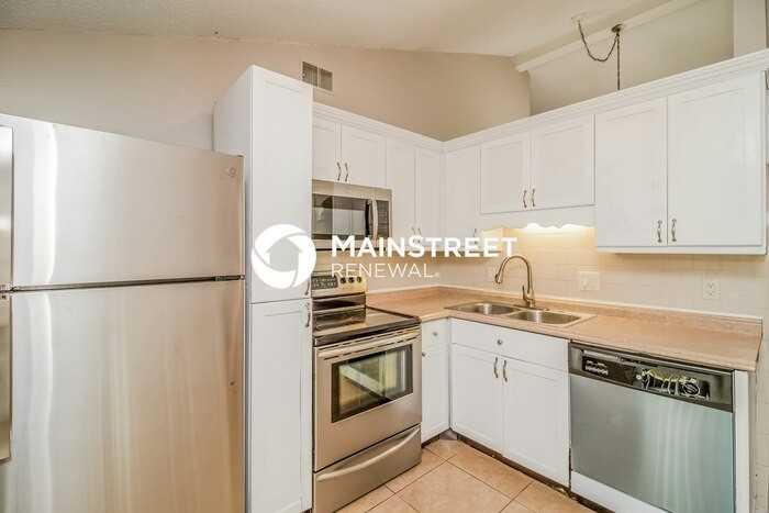 10114 Enchanted Oaks Ct - Photo 7 of 16