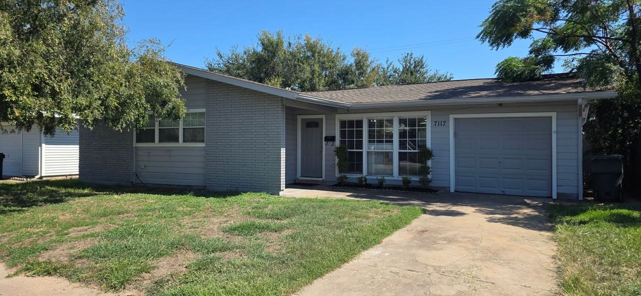 7117 Poplar Dr - Photo 2 of 13
