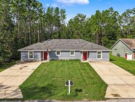9342/9344 N PEACHTREE Way - Photo 1 of 1