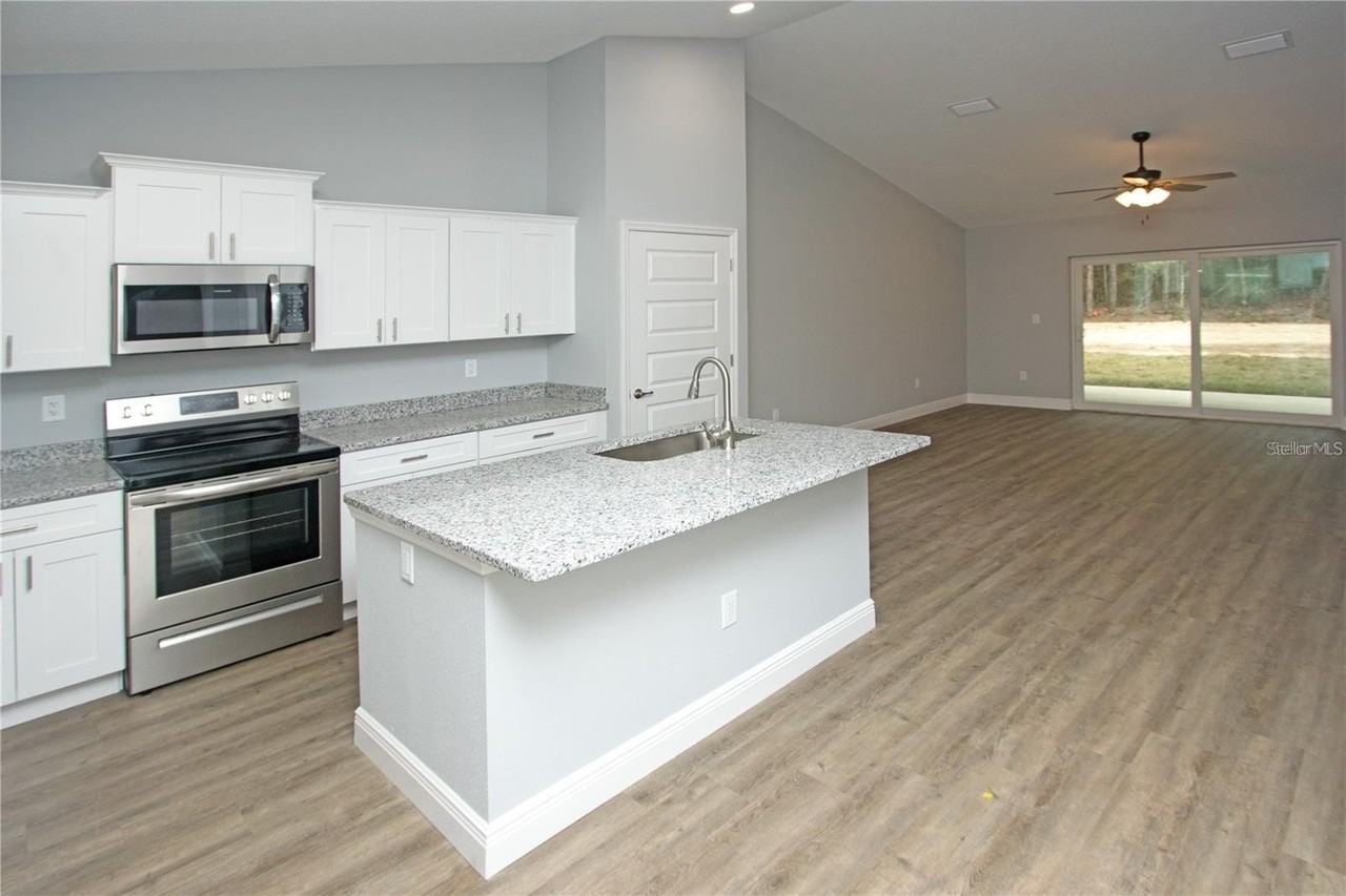 9342/9344 N PEACHTREE Way - Photo 6 of 34