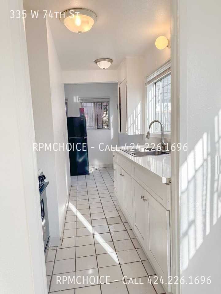 335 W 74th St - Photo 5 of 20