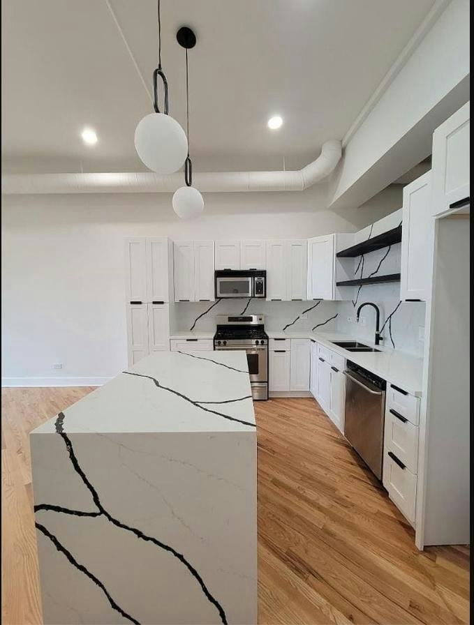 1400 North Milwaukee Avenue, Unit 304 - Photo 2 of 21